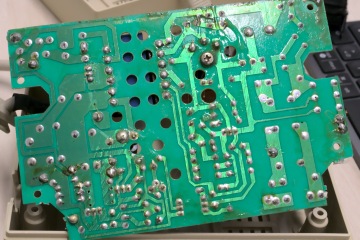 There is some dried liquid all over the PCB.