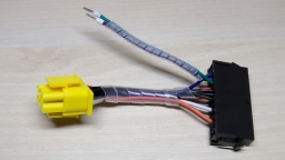 The self-made ATX adapter, with two extra wires for the power switch.