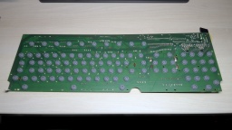 The keyboard's PCB, with the rubber domes.