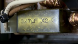 This RIFA capacitor shows signs of fatigue.