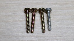 One case screw is shorter, and has a different color.
