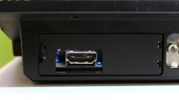 A black trapdoor for the HDMI connector.