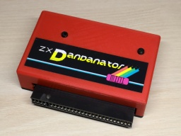 The ZX Dandanator Mini in its printed case.