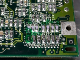The bottom side of the audio area, as I found it. There is a strange solder blob covered in varnish.