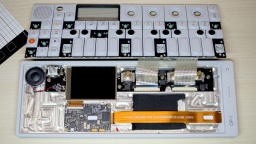 The opened OP-1, with the battery already removed.